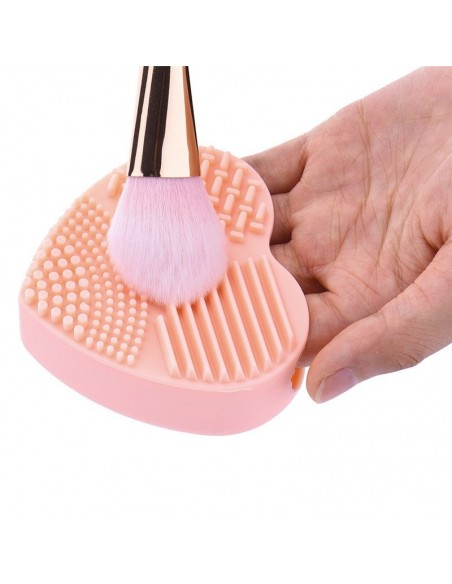 Brush cleaning glove in the shape of a heart